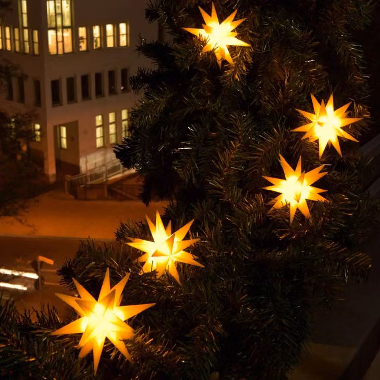 Sterntaler LED lichtketting met 9 sterren voor buiten in geel en oranje