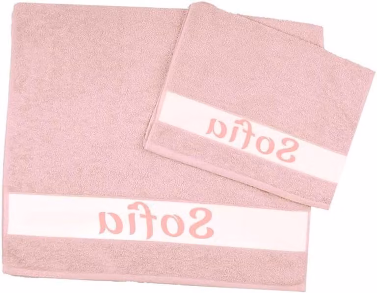 Gepersonaliseerde handdoeken set van badstof in het roze, bestaande uit een handdoek van 60 x 110 cm en een gastendoekje van 40 x 60 cm