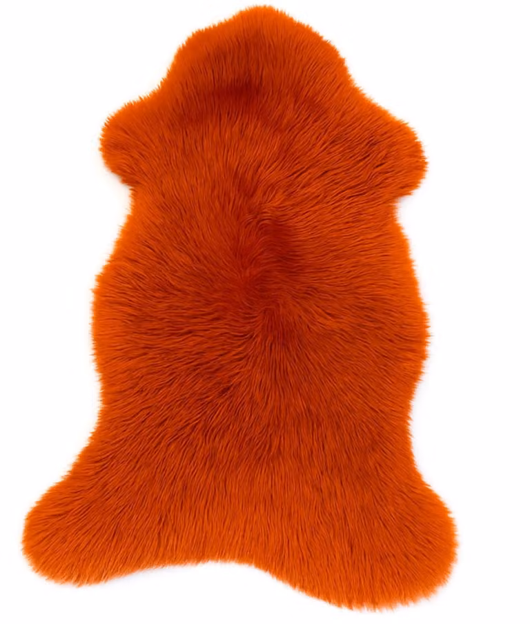 Echte Texelse schapenvacht donker oranje voor stoel, bank of vloerkleed