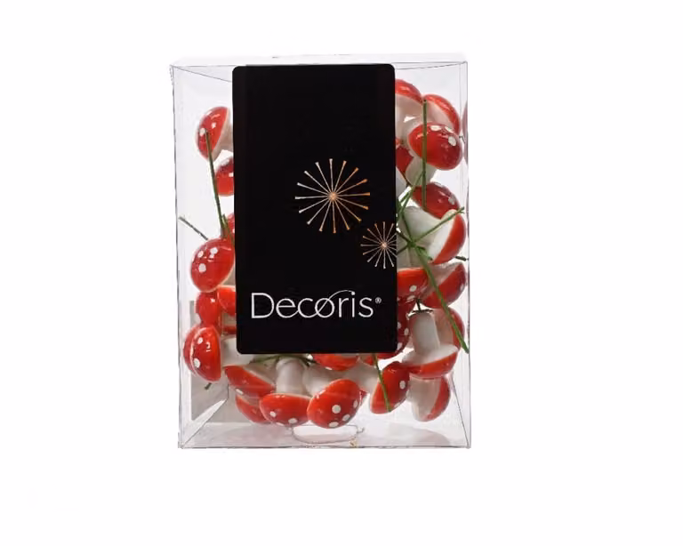 Kleine decoratieve paddenstoel op steel in rood en wit met stippen